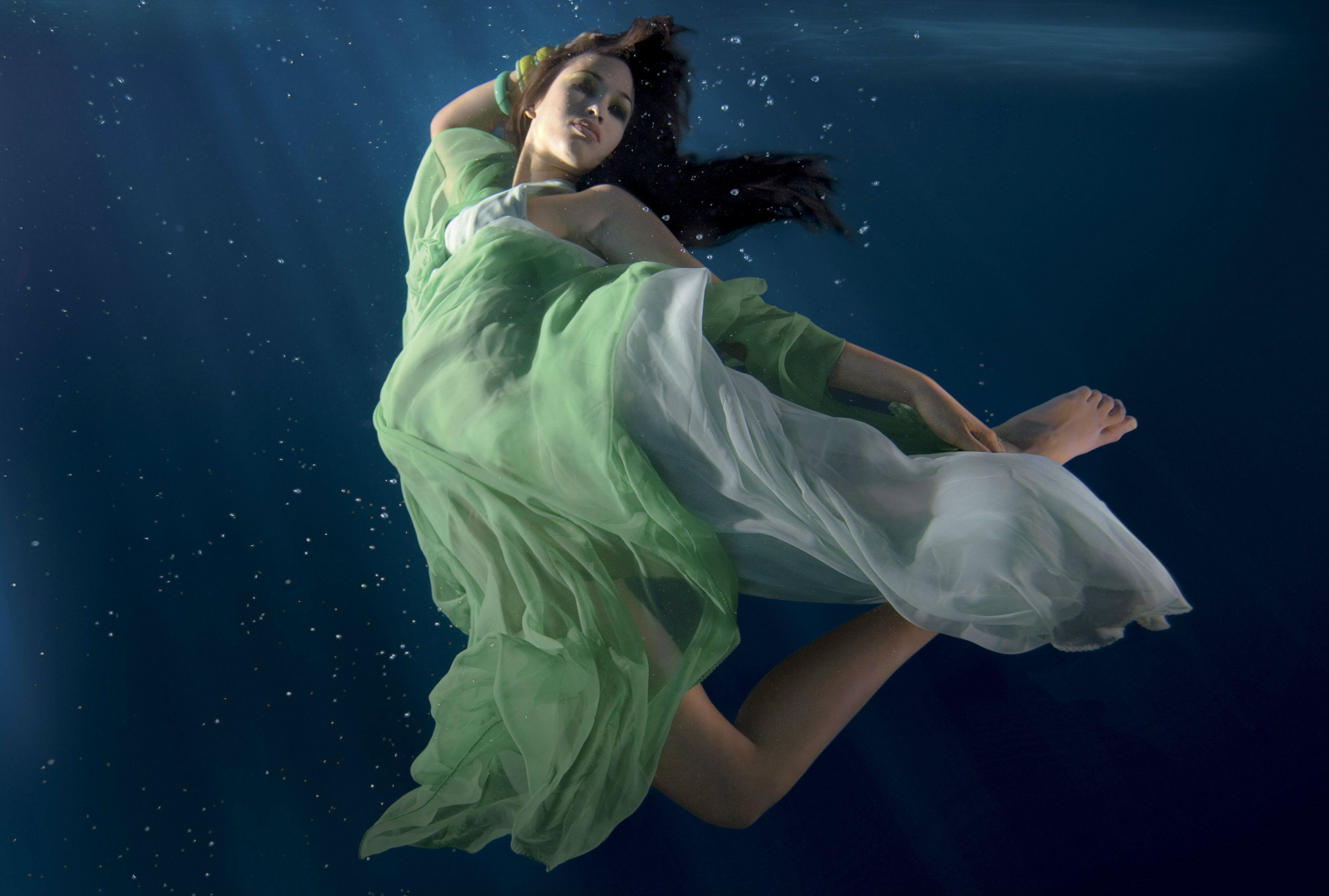 Fabric billowing underwater, demonstrating drape behavior without gravity's downward pull